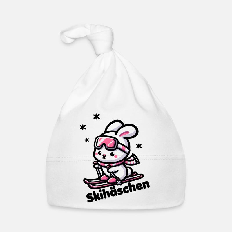 Mignon lapin de ski avec des lunettes de ski roses dans la neige Bonnet bio Bébé