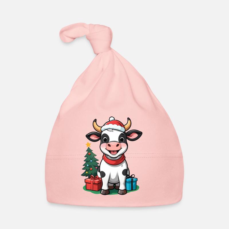 Vache mignonne célébrant Noël. Bonnet bio Bébé