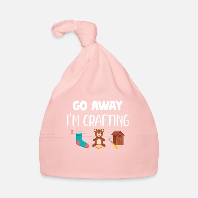 Va-t’en, je fais de la poterie, du scrapbooking, Bonnet bio Bébé