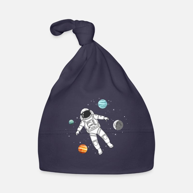 Un astronaute flotte dans l’espace avec des planètes Bonnet bio Bébé