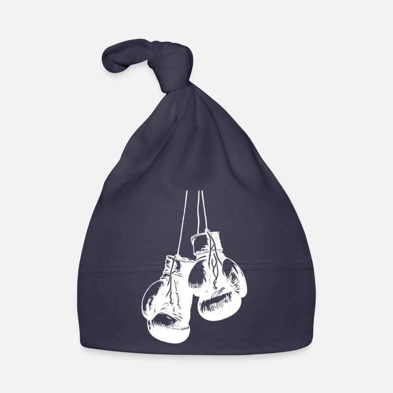Conception de gants de boxe blancs suspendus. Conception de logo Bonnet bio Bébé