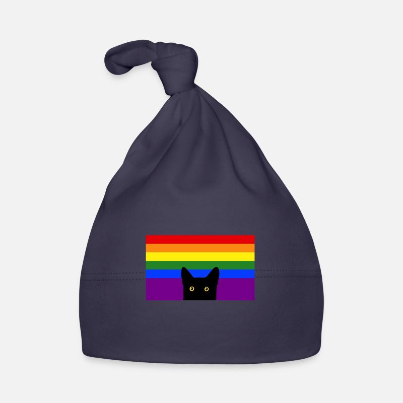 Chat jetant un coup d’œil sur le drapeau arc-en-ciel Bonnet bio Bébé