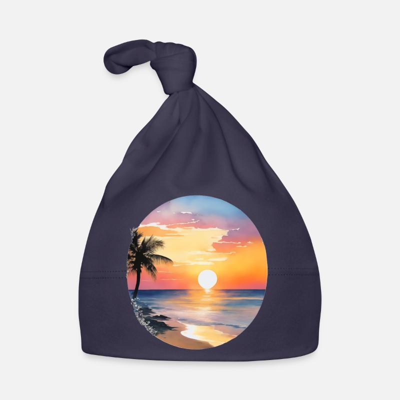 Coucher de soleil sur la plage Bonnet bio Bébé