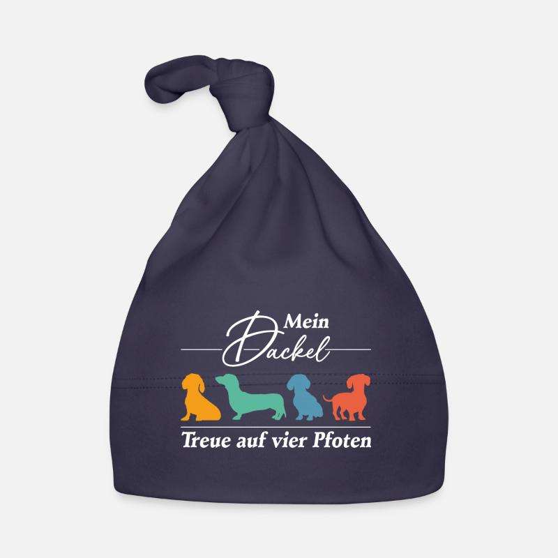 Dackel Treue auf vier Pfoten. Dackelsilhouette Baby Bio-Mütze