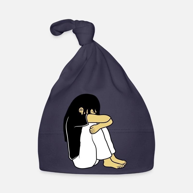 Trauriges Sitzendes Mädchen Baby Bio-Mütze