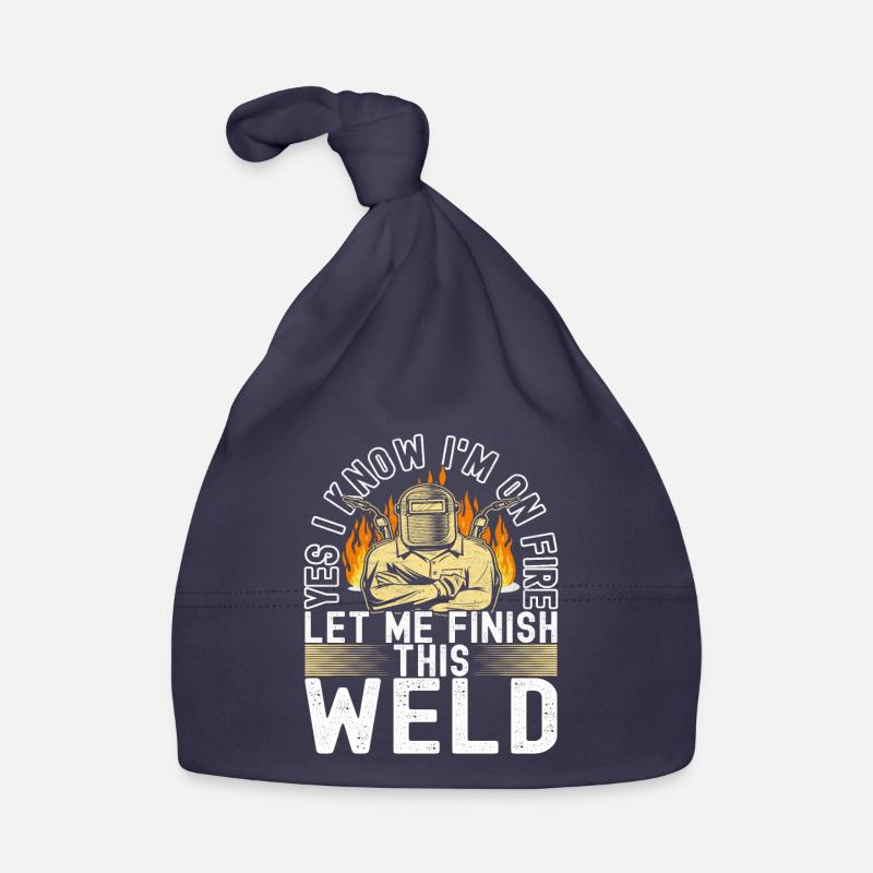 Welder welding Organic Baby Cap