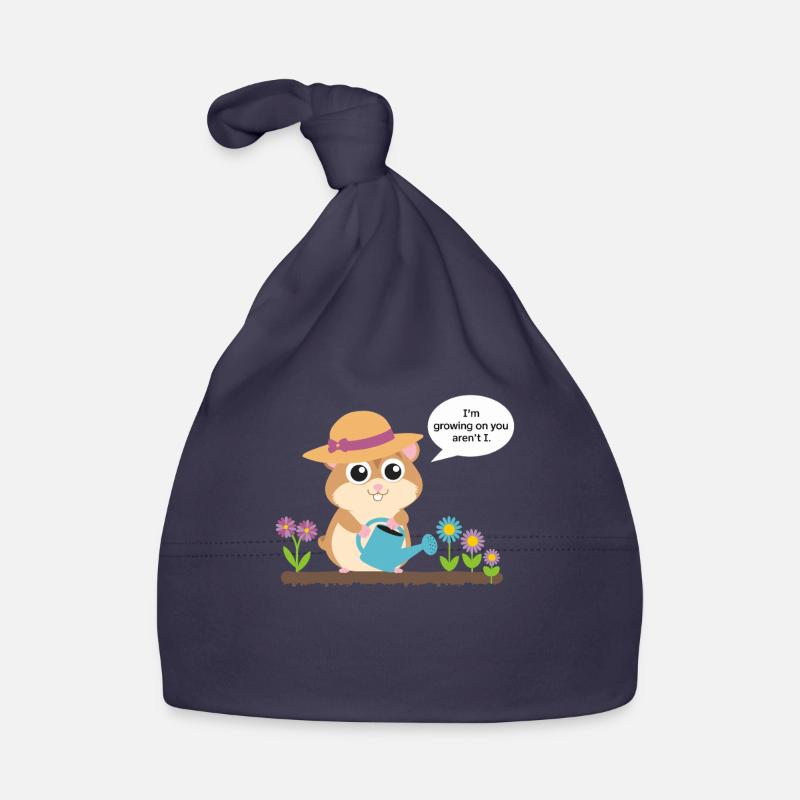 Croissance du hamster avec arrosoir dans le jardin Bonnet bio Bébé
