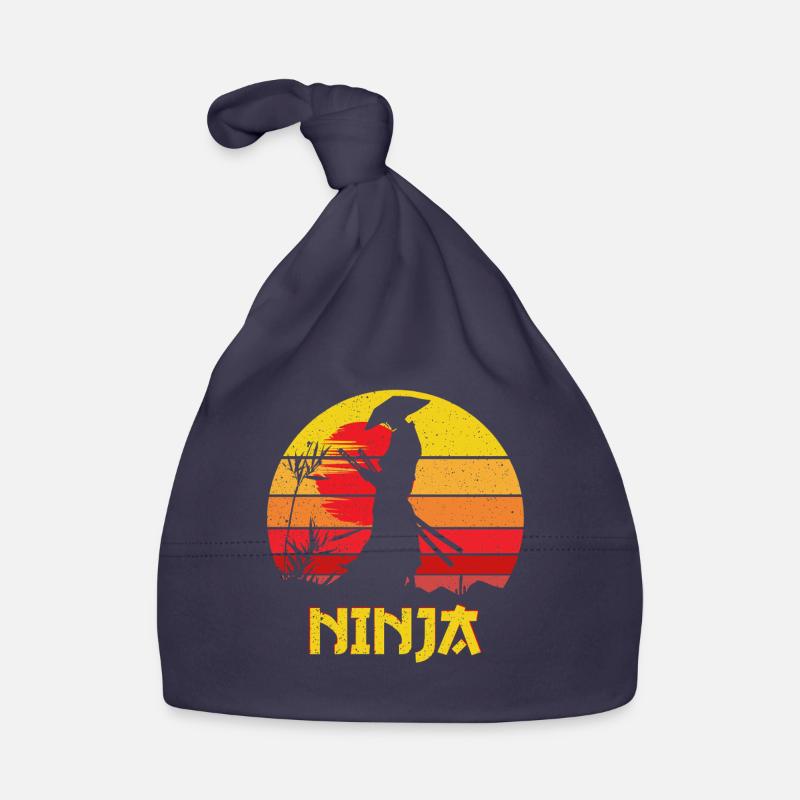 Silhouette de Ninja du Coucher de Soleil Bonnet bio Bébé