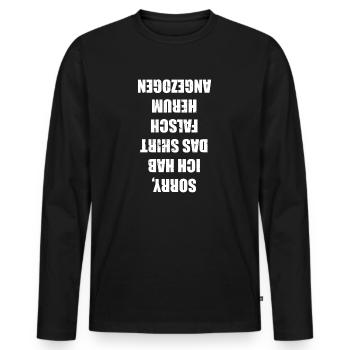 Lustiges Shirt mit Spruch Falsch Herum Angezogen - Männer Premium Bio Langarmshirt - Schwarz - Vorne - Nico (187cm)