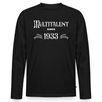 Multitalent since 1933. Lustiges Jahrgangs - Männer Premium Bio Langarmshirt - Schwarz - Vorne - Nico (187cm)