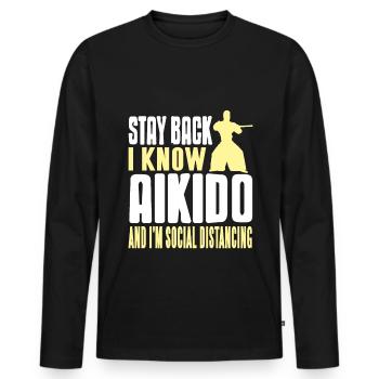 Stay back i know aikido and im social distancing - Männer Premium Bio Langarmshirt - Schwarz - Vorne - Nico (187cm)