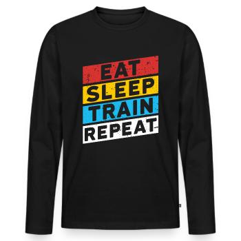 TRAINIEREN | EAT SLEEP TRAIN REPEAT - Männer Premium Bio Langarmshirt - Schwarz - Vorne - Nico (187cm)