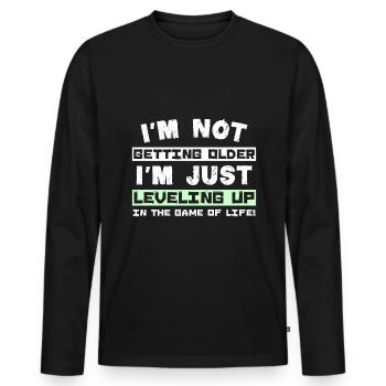 I'm not getting older I'm just leveling up in the - Männer Premium Bio Langarmshirt - Schwarz - Vorne - Nico (187cm)