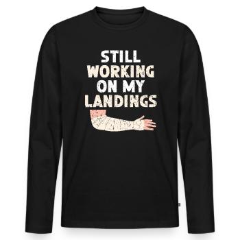 Ich arbeite immer noch an meinen Landungen Broken Hand Verletzung - Männer Premium Bio Langarmshirt - Schwarz - Vorne - Nico (187cm)