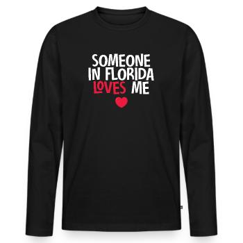 Jemand in Florida liebt mich - Männer Premium Bio Langarmshirt - Schwarz - Vorne - Nico (187cm)