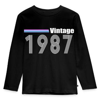 1987 - Kinder Premium Bio Langarmshirt - Schwarz - Vorne - AI Model Kid Male (0cm)