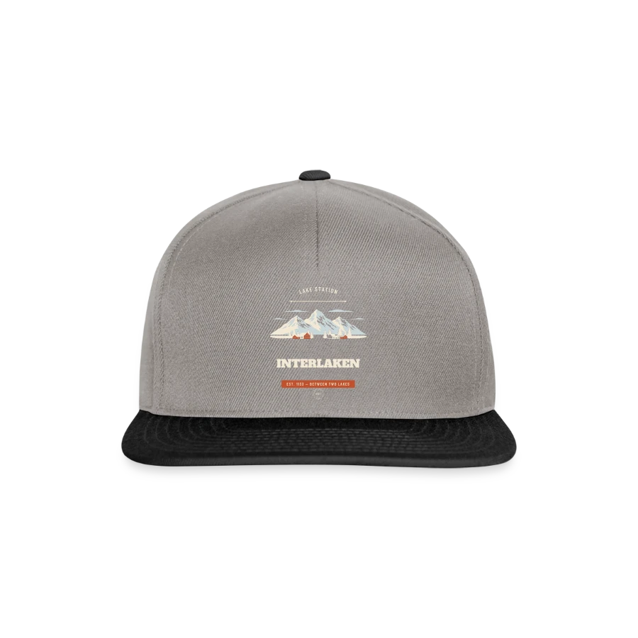 Interlaken badge on a snapback cap, graphite/black