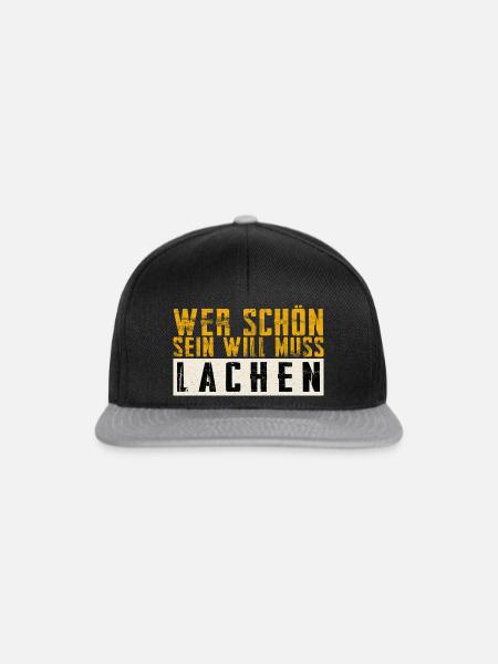 Schöner Spruch: Wer schön sein will, muss lachen! - Snapback Cap - Schwarz/Grau