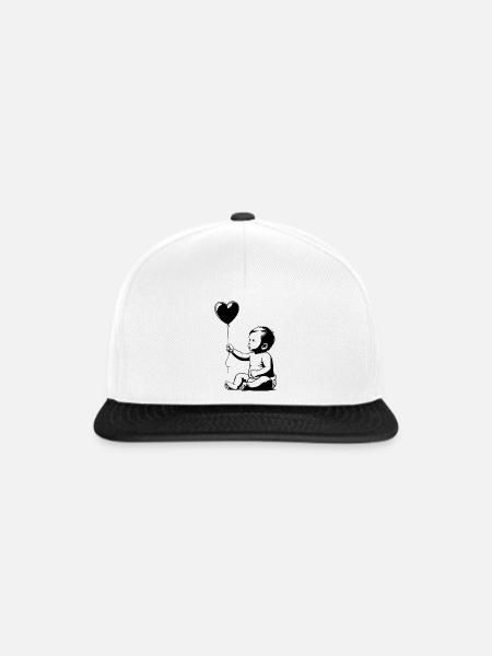 inspiredby.Baby mit Luftballon - Snapback Cap - Weiß/Schwarz