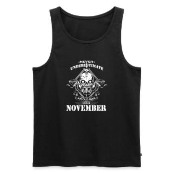 Never underestimate an old man in November - Men's Premium Organic Tank Top - black - Front - AI Model Male 178 light (178cm)