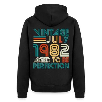 Vintage Perfektion im Juli 1982 - Unisex Premium Bio Zip Hoodie - Schwarz - Hinten - Nico (187cm)
