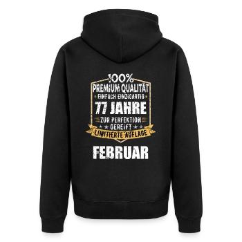 77. Geburtstag FEBRUAR Jahrgang 1947 Geschenkidee - Unisex Premium Bio Zip Hoodie - Schwarz - Hinten - Nico (187cm)