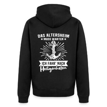 Heiligenhafen Sprüche - Unisex Premium Bio Zip Hoodie - Schwarz - Hinten - Nico (187cm)
