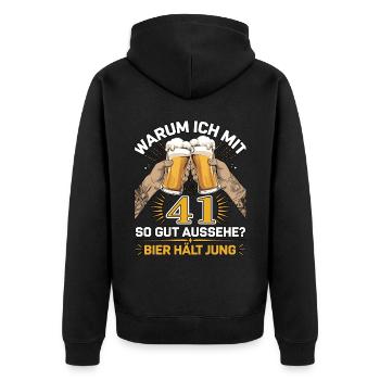 Pourquoi est-ce que j’ai l’air si bien à 41 ans ? La bière vous garde jeune - Veste à capuche bio Premium Unisexe - noir - Dos - Nico (187cm)