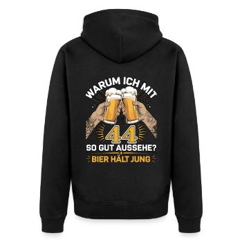 Pourquoi est-ce que j’ai l’air si bien à 44 ans ? La bière vous garde jeune - Veste à capuche bio Premium Unisexe - noir - Dos - Nico (187cm)