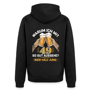 Pourquoi est-ce que j’ai l’air si bien à 49 ans ? La bière vous garde jeune - Veste à capuche bio Premium Unisexe - noir - Dos - Nico (187cm)