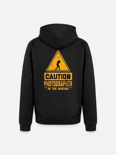 CAUTION Photographer In The Making - Unisex Premium Organic Zip Hoodie - black