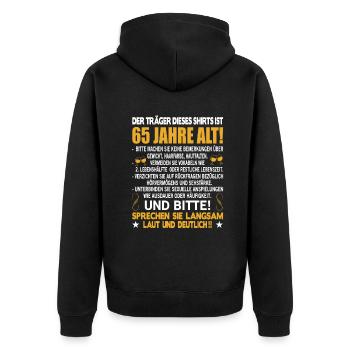 Der Träger dieses Shirts ist 65 Jahre alt 65. - Unisex Premium Bio Zip Hoodie - Schwarz - Hinten - Nico (187cm)