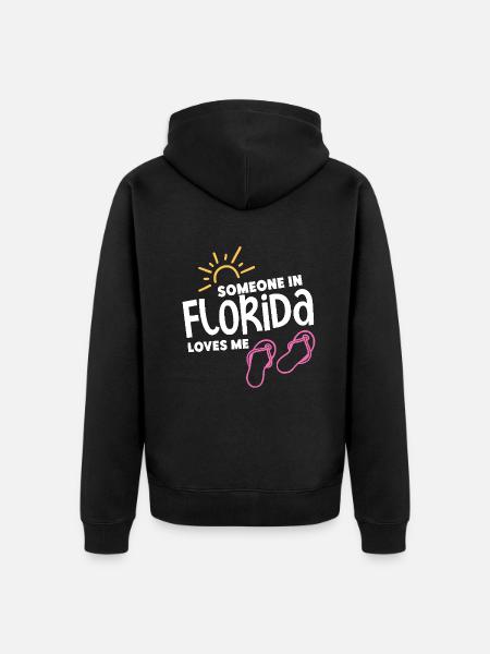 Quelqu’un en Floride m’aime - Veste à capuche bio Premium Unisexe - noir