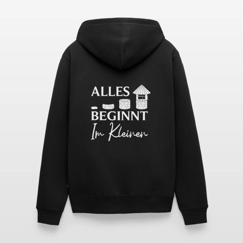 Construction de puits Tout commence dans le constructeur de petits puits Veste à capuche bio Premium Unisexe