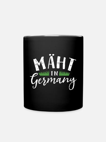 Mäht in Germany - Rasenmäher - Mähen - Wortspiel - Tasse einfarbig - Schwarz