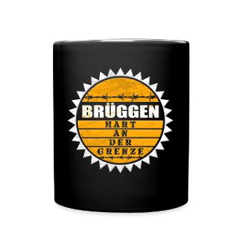 Brüggen - hart an der Grenze - Tasse einfarbig - Schwarz - Vorne