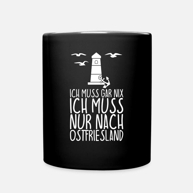 Ich muss gar nix Ich muss nur nach OSTFRIESLAND - Tasse einfarbig - Schwarz