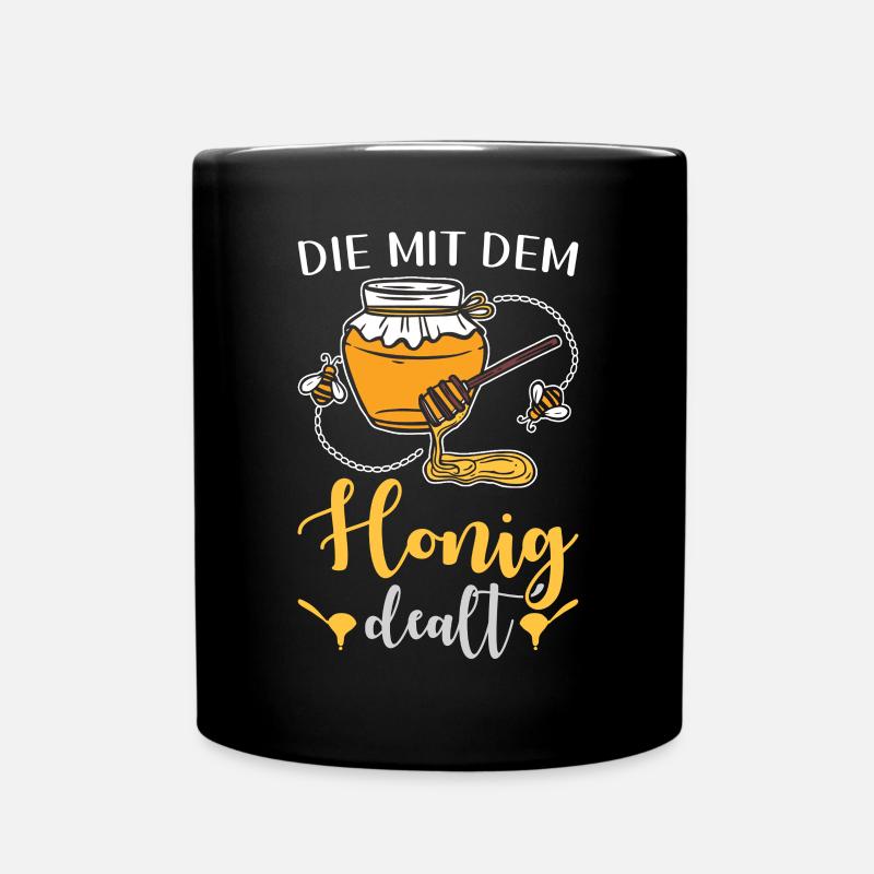 Die mit dem Honig dealt Lustiges Imker - Tasse einfarbig - Schwarz