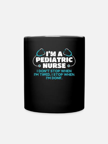 Dans Une chemise d’infirmière pédiatrique - Mug uni - noir
