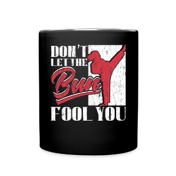 Ne vous laissez pas tromper par le chignon - Mug uni - noir - Devant