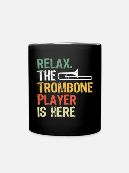 Détendez-vous le tromboniste est ici musique de trombone - Mug uni - noir