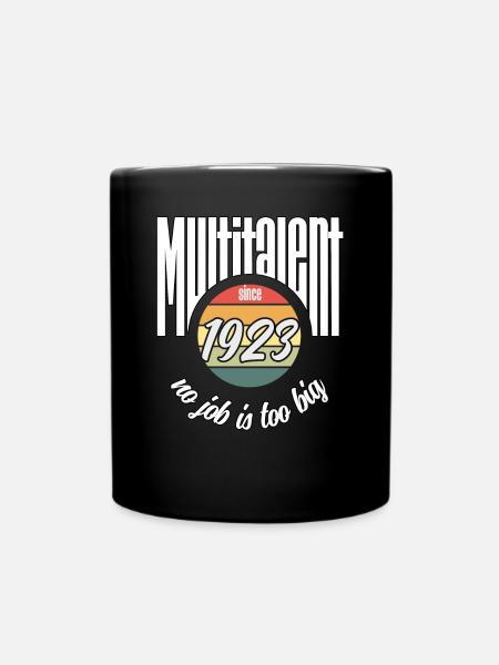 Multi-talentueux depuis 1923. Drôle de millésime - Mug uni - noir