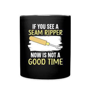 If you see a seam ripper, there is no g - Full Colour Mug - black - Front