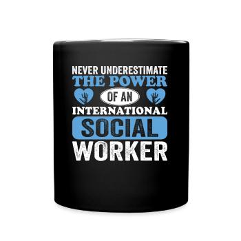 Never Underestimate The Power Of An International - Tasse einfarbig - Schwarz - Vorne