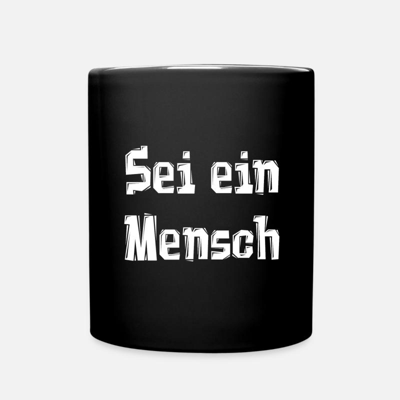 Sei ein Mensch - Tasse einfarbig - Schwarz