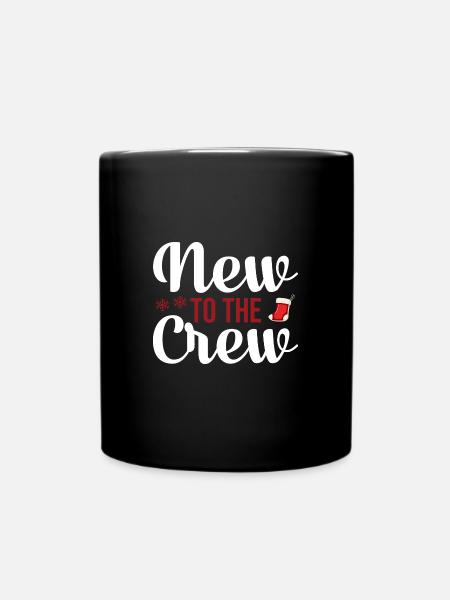Neu in der Team Weihnachten - Tasse einfarbig - Schwarz