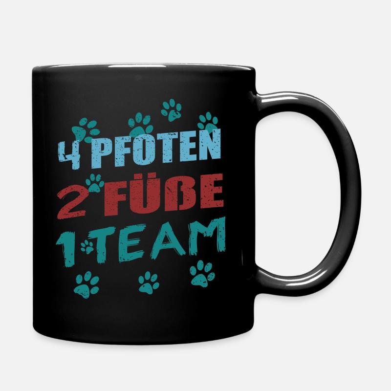 4 Pfoten, 2 Füße, 1 Team - Hunde T-Shirt - Tasse einfarbig - Schwarz