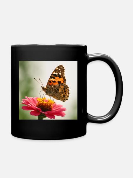 Schmetterling auf einer rosa Blume - Tasse einfarbig - Schwarz