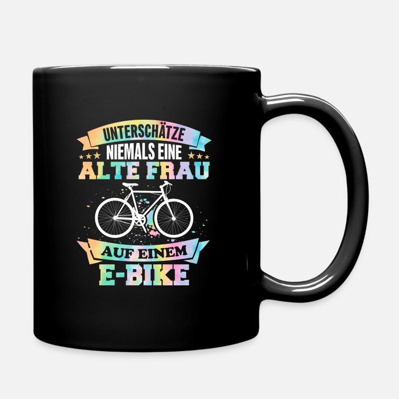 Unterschätze niemals eine Frau mit einem E-Bike - Tasse einfarbig - Schwarz