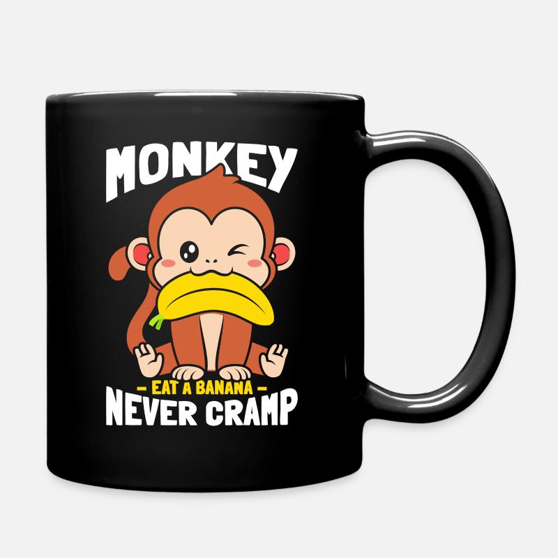 Singe mangeant de la banane sans crampe - Mug uni - noir